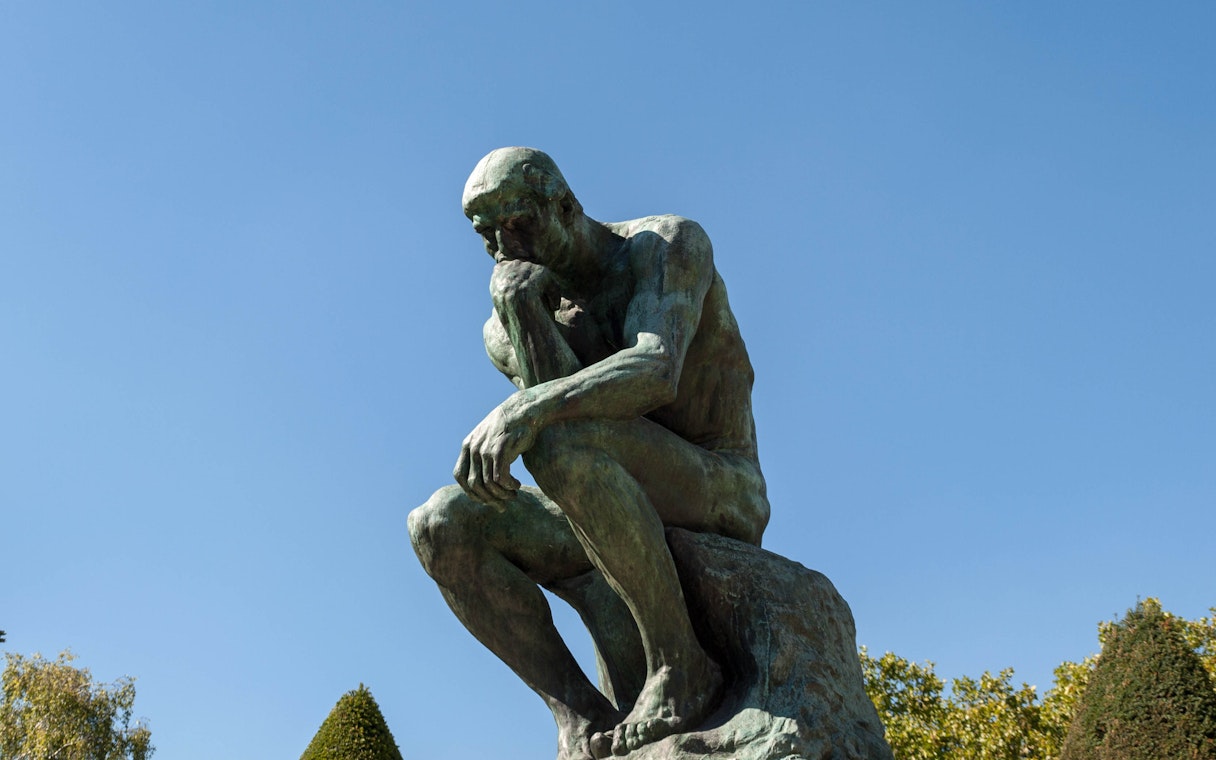 The Thinker sculpture in Rodin Museum gardens, Paris.
