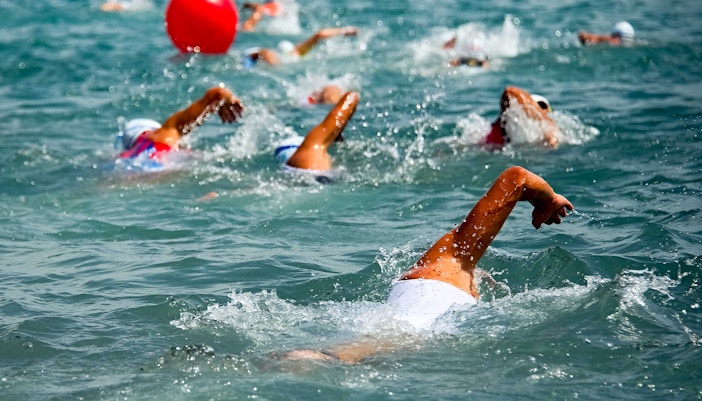 Swimmers in the sea during Christmas event in Barcelona.