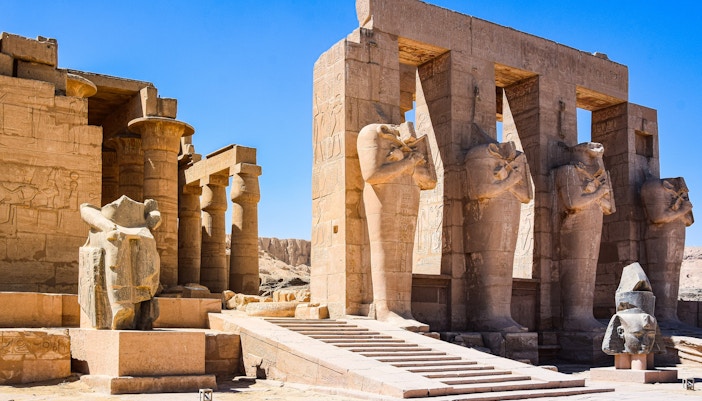 Visitors exploring exhibits at the Egyptian Museum in Barcelona.
