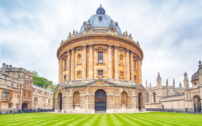 Radcliffe Camera at Oxford University, England, with surrounding historic architecture.