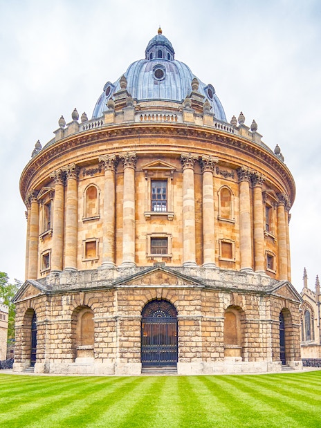 Radcliffe Camera at Oxford University, England, with surrounding historic architecture.