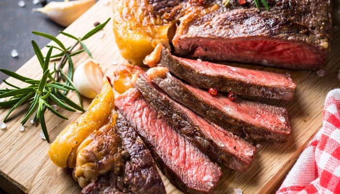 Visitors enjoying a meal at Dubai Expo 2020 with international cuisine options.