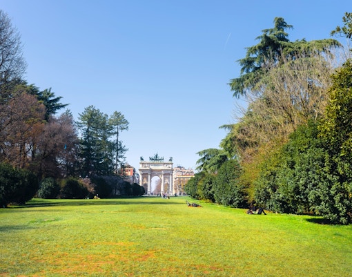 Sempione Park with view of Arco della Pace in Milan, Italy.