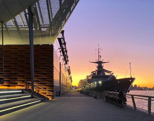 Statue of Liberty Cruise with view of the iconic statue and New York City skyline in the background.