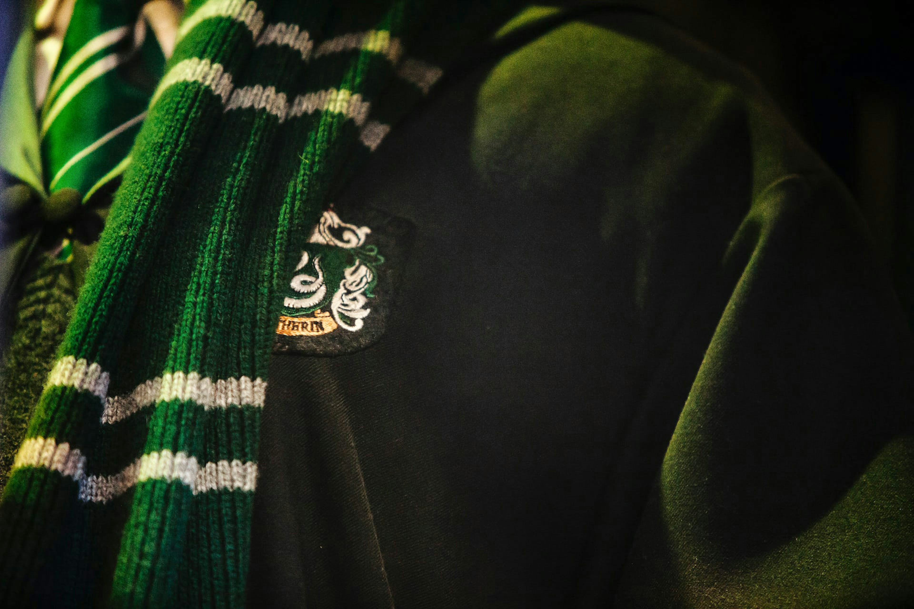 Harry Potter Studio Shop scarf display with Hogwarts house colors