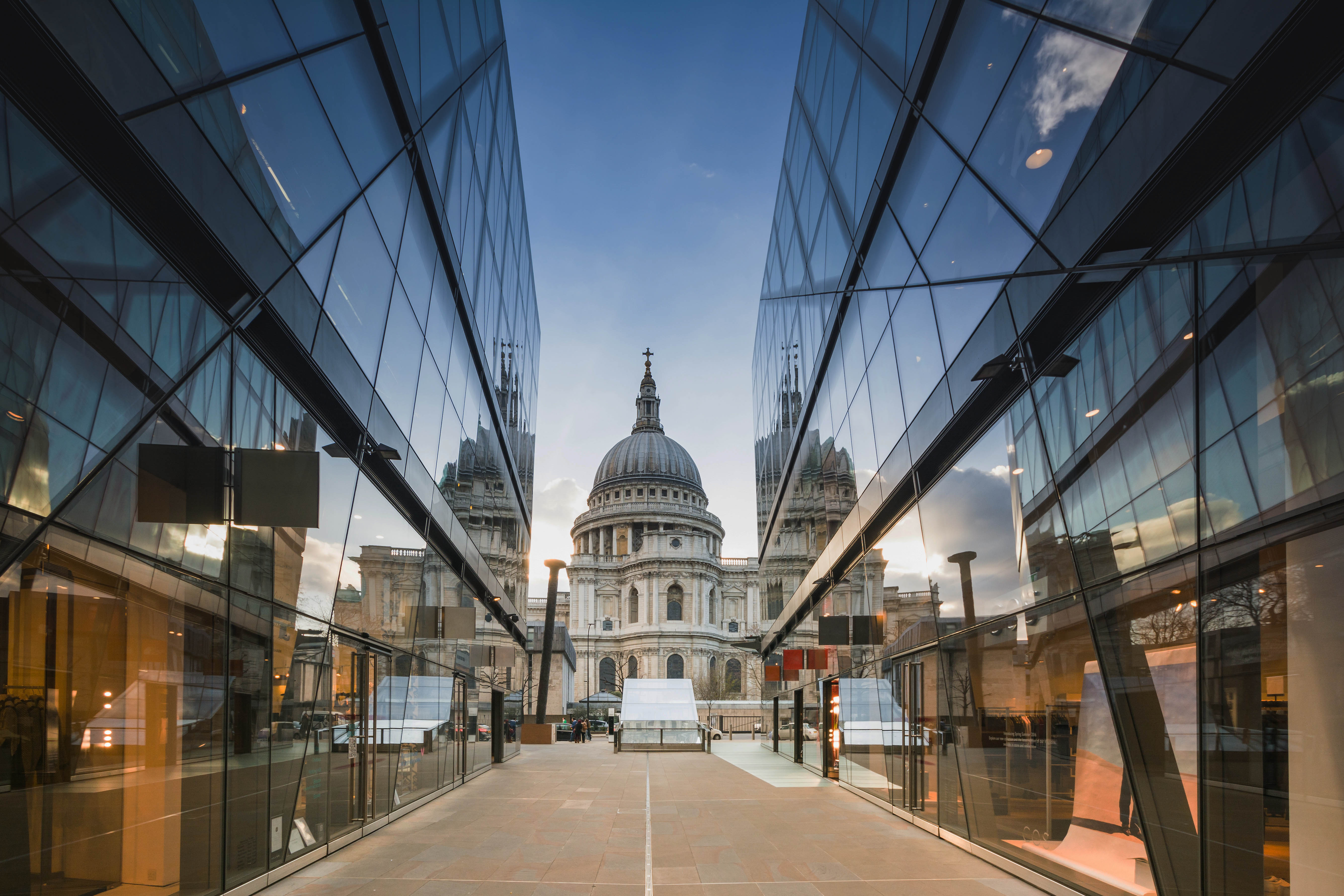 St Paul's Cathedral framed by modern glass buildings in London.