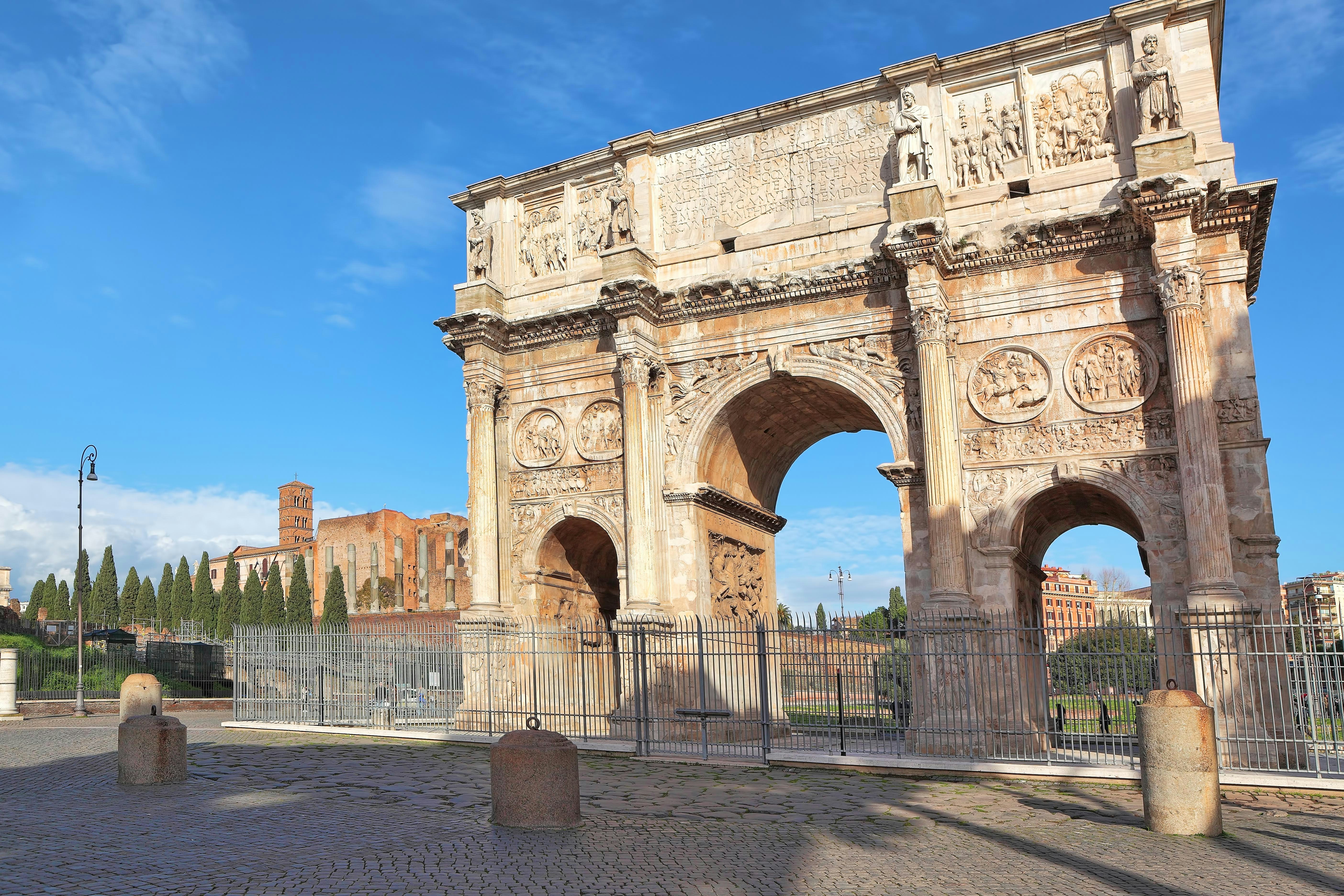 Arch of Constantine in Rome with detailed carvings and ancient architecture.