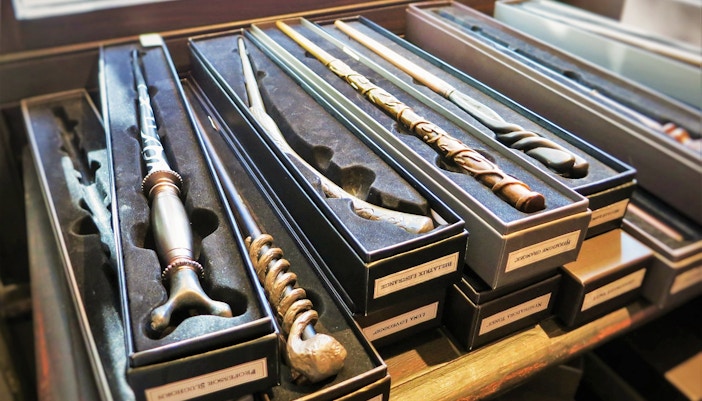 Wands displayed in boxes at Harry Potter Studio Shop.