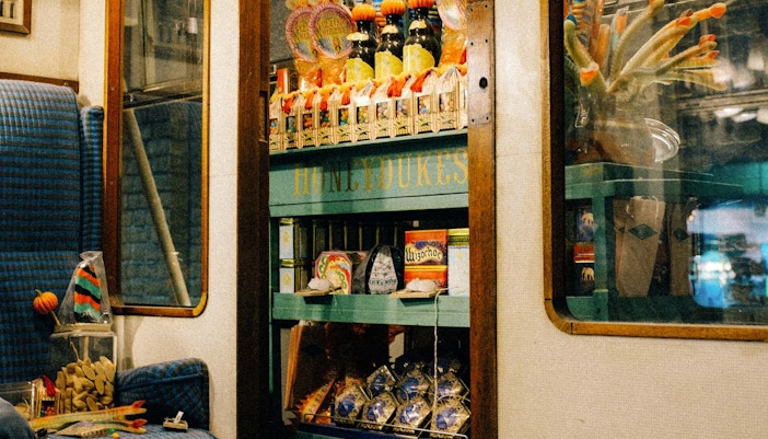 Harry Potter Studio shop with wands and merchandise on display, London, UK.