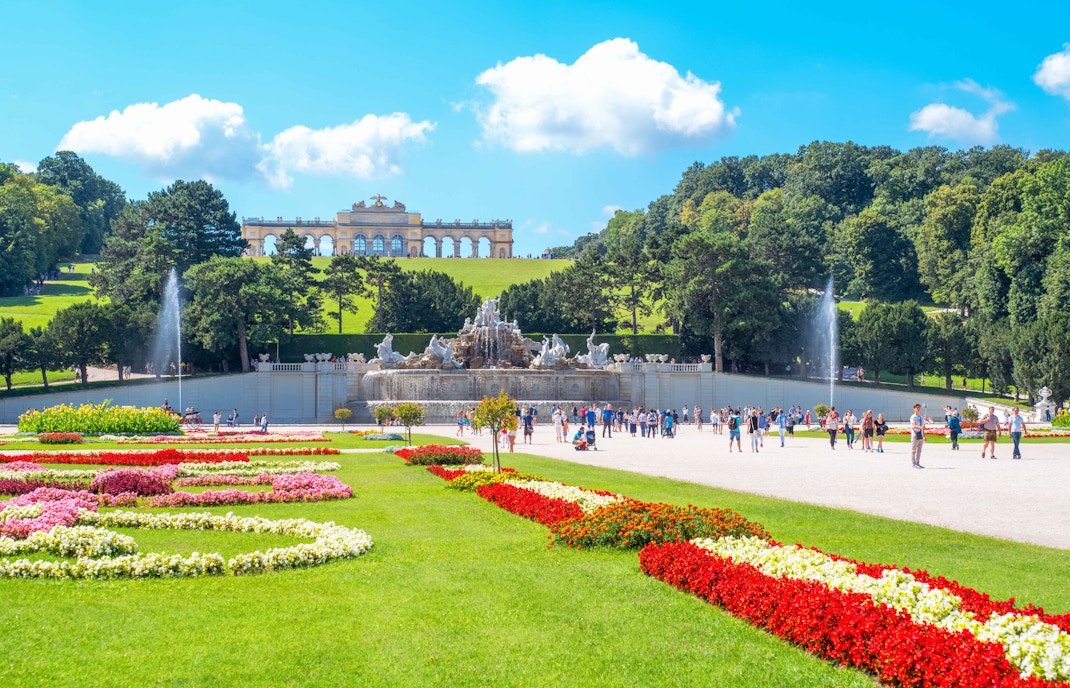 Schonbrunn Palace gardens with fountain and Gloriette in Vienna, Austria.