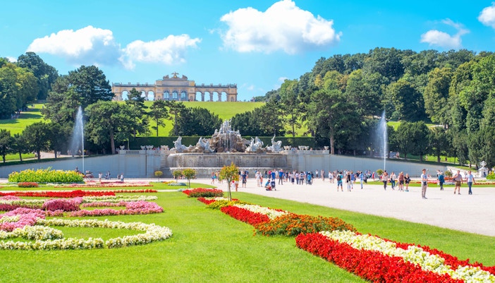 Schonbrunn Palace gardens with fountain and Gloriette in Vienna, Austria.