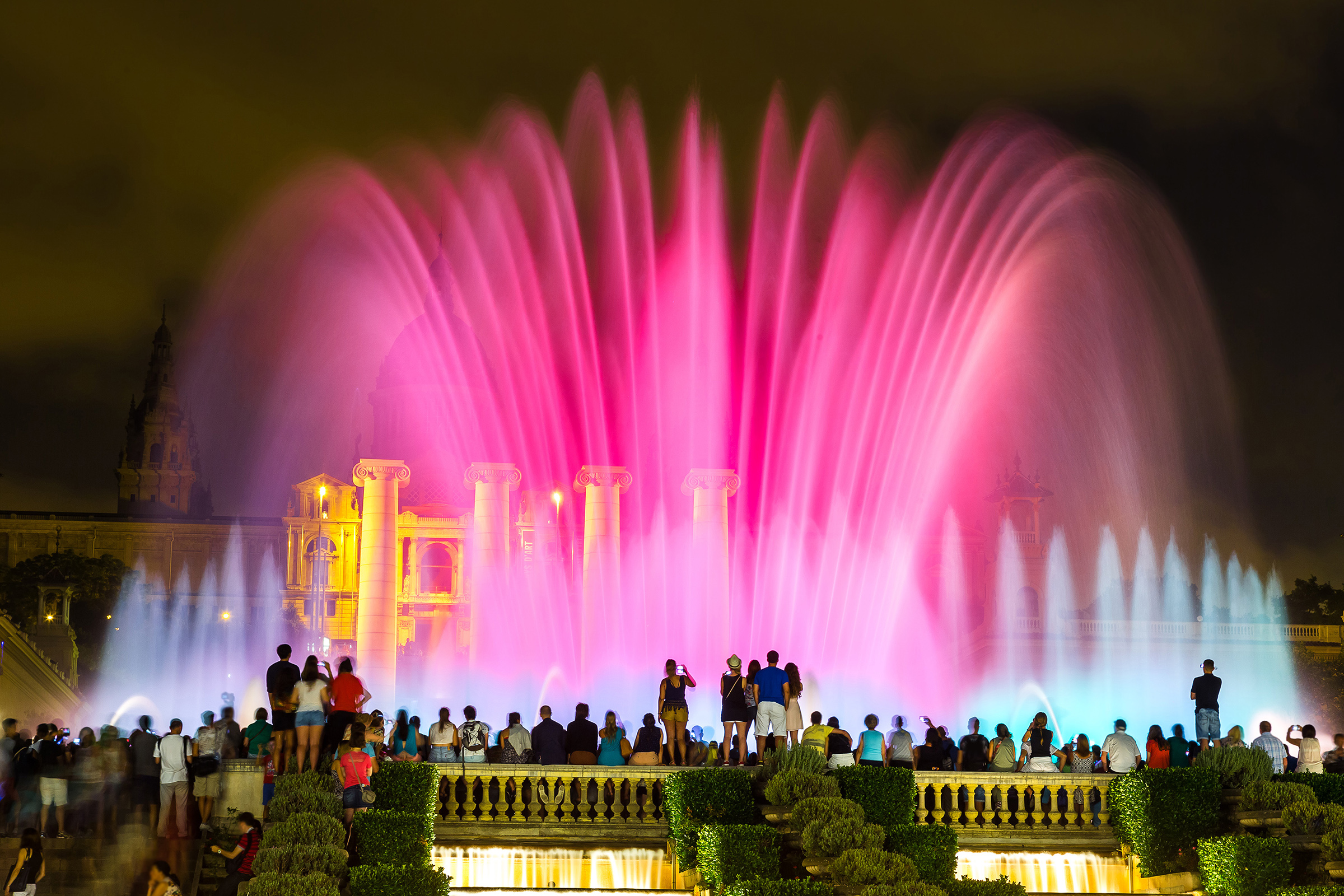 Magic Fountain light show in Barcelona with colorful water displays.