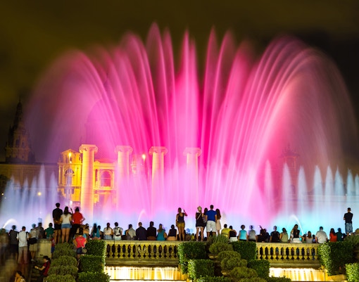 Magic Fountain light show in Barcelona with colorful water displays.