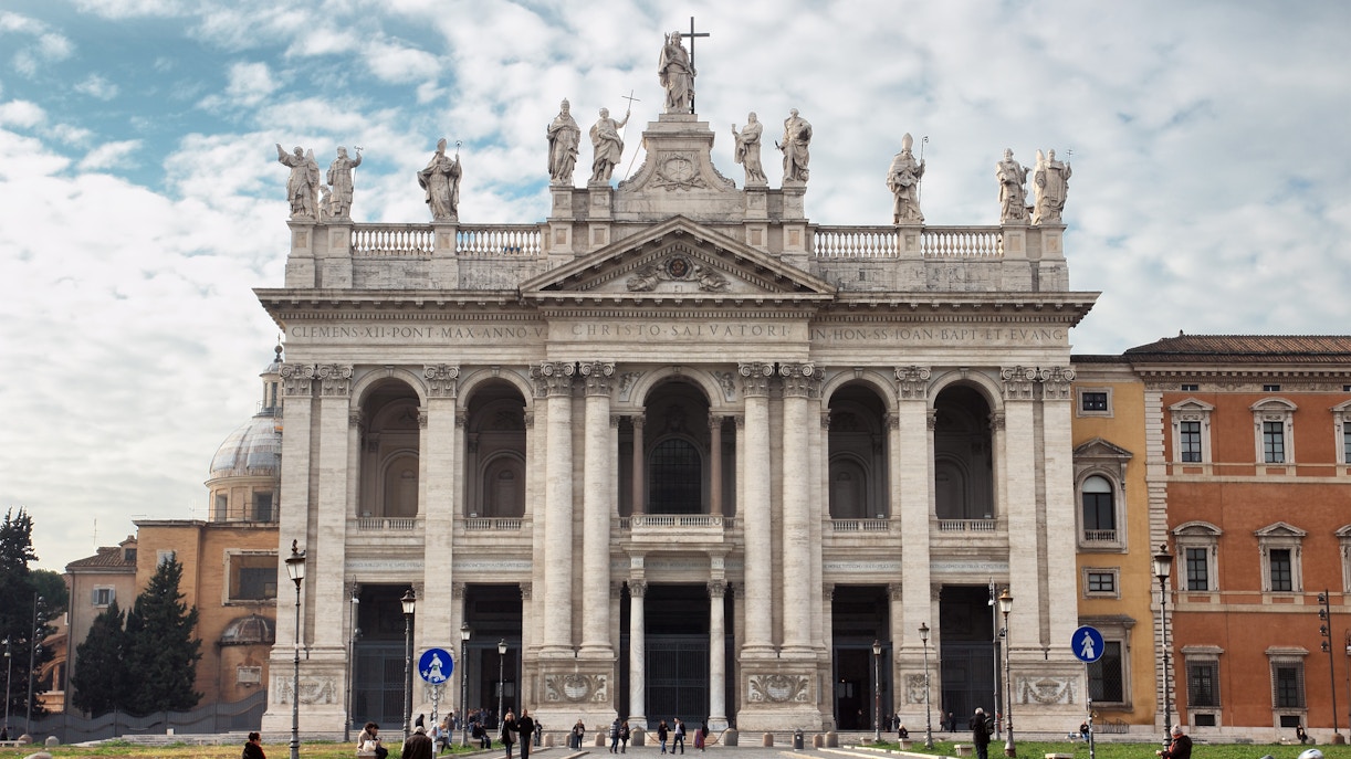 Archbasilica of St. John Lateran facade in Rome with statues and columns.