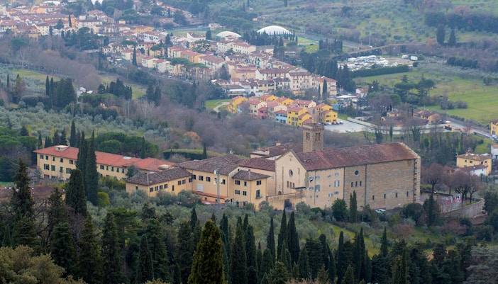 San Domenico Fiesole view with historic buildings and lush landscape near Florence.