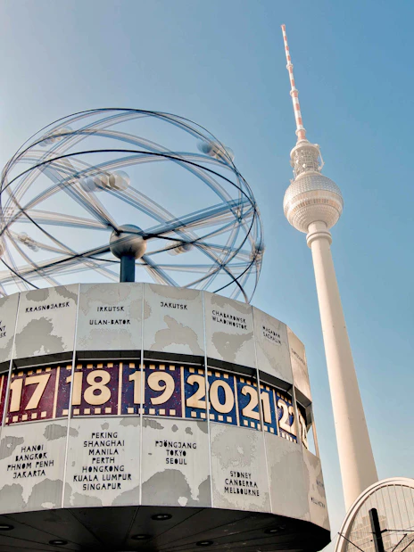 World clock and TV tower at Alexanderplatz, Berlin during Christmas season.