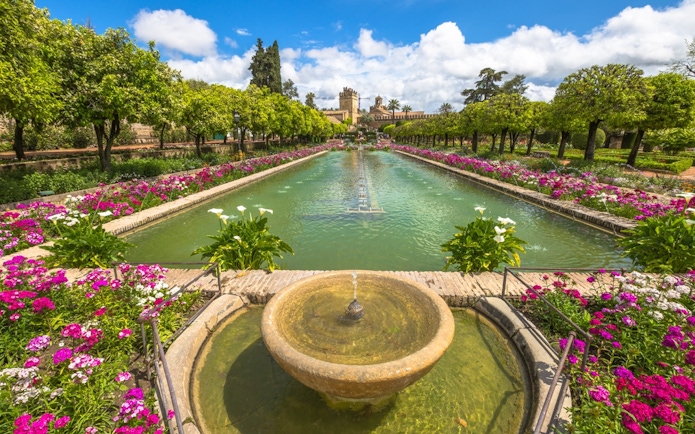 Fountain and gardens at Alcazar Cordoba's Royal Baths of Doña Leonor.