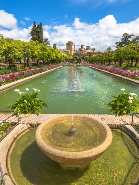 Fountain and gardens at Alcazar Cordoba's Royal Baths of Doña Leonor.