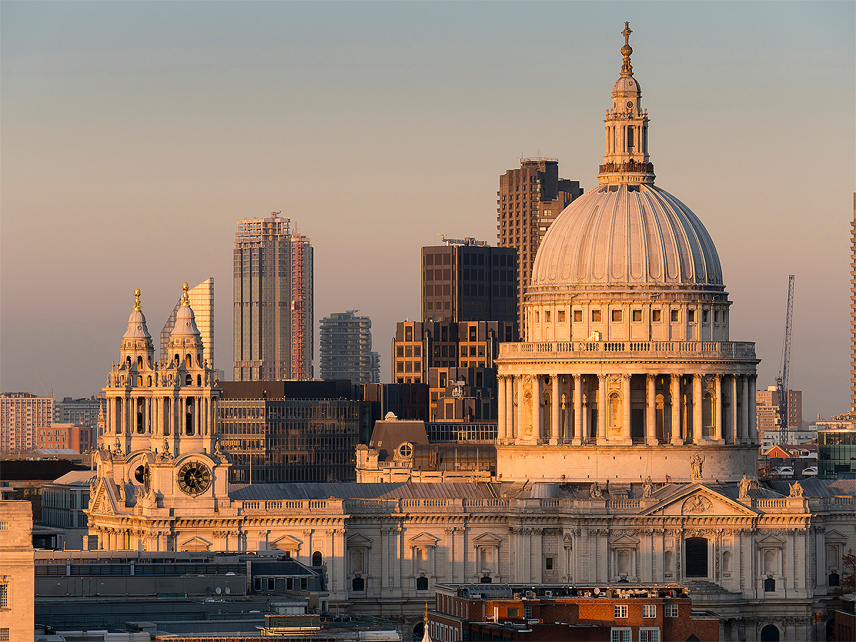 St Paul's Cathedral dome and towers with city skyline in London.