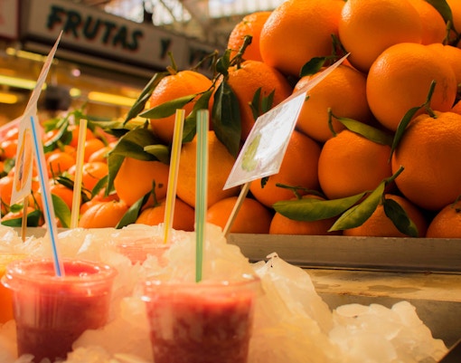 Oranges and fresh juice at a market stall in Barcelona.