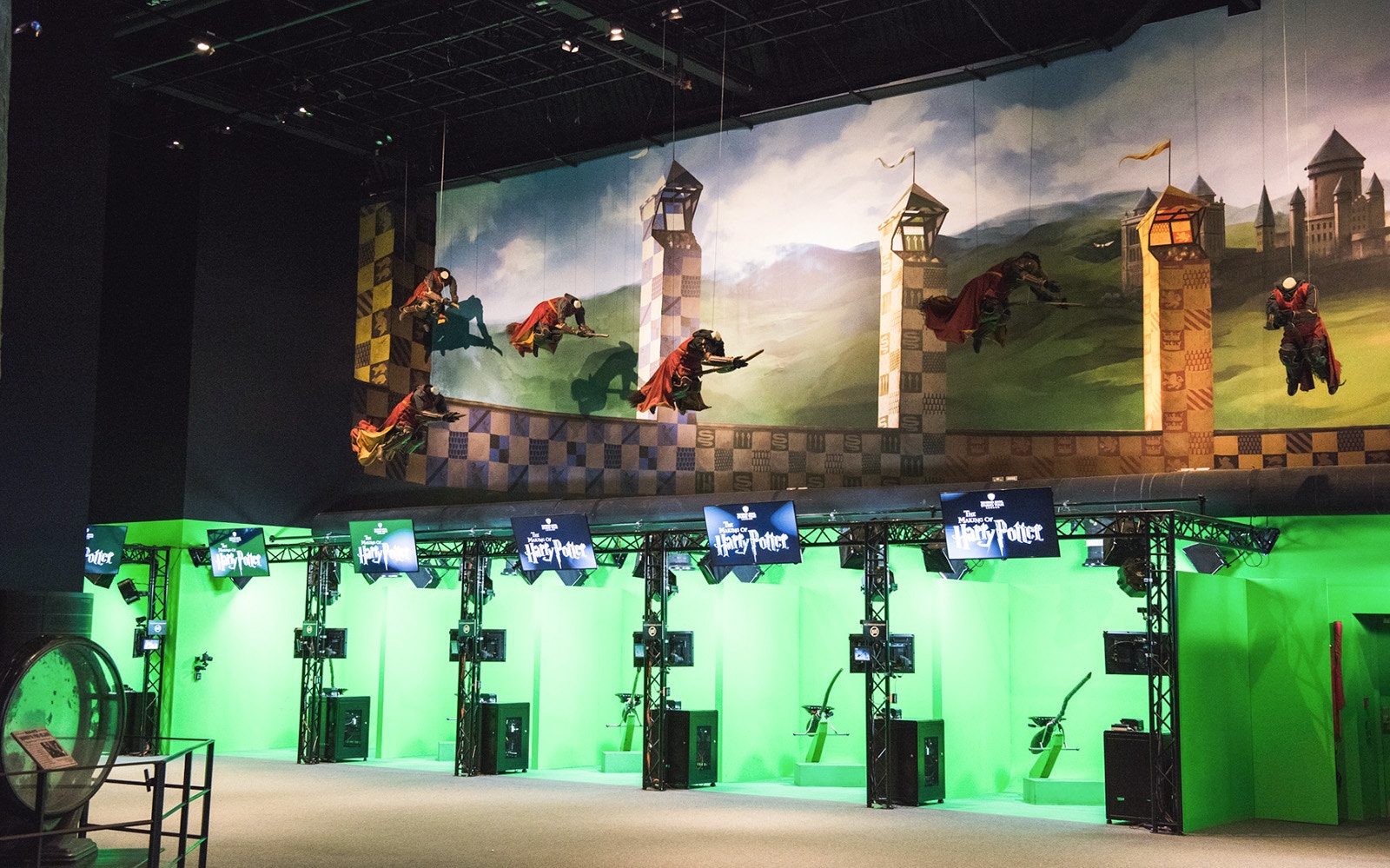 Quidditch set at Harry Potter Studio, featuring broomsticks and golden snitch.
