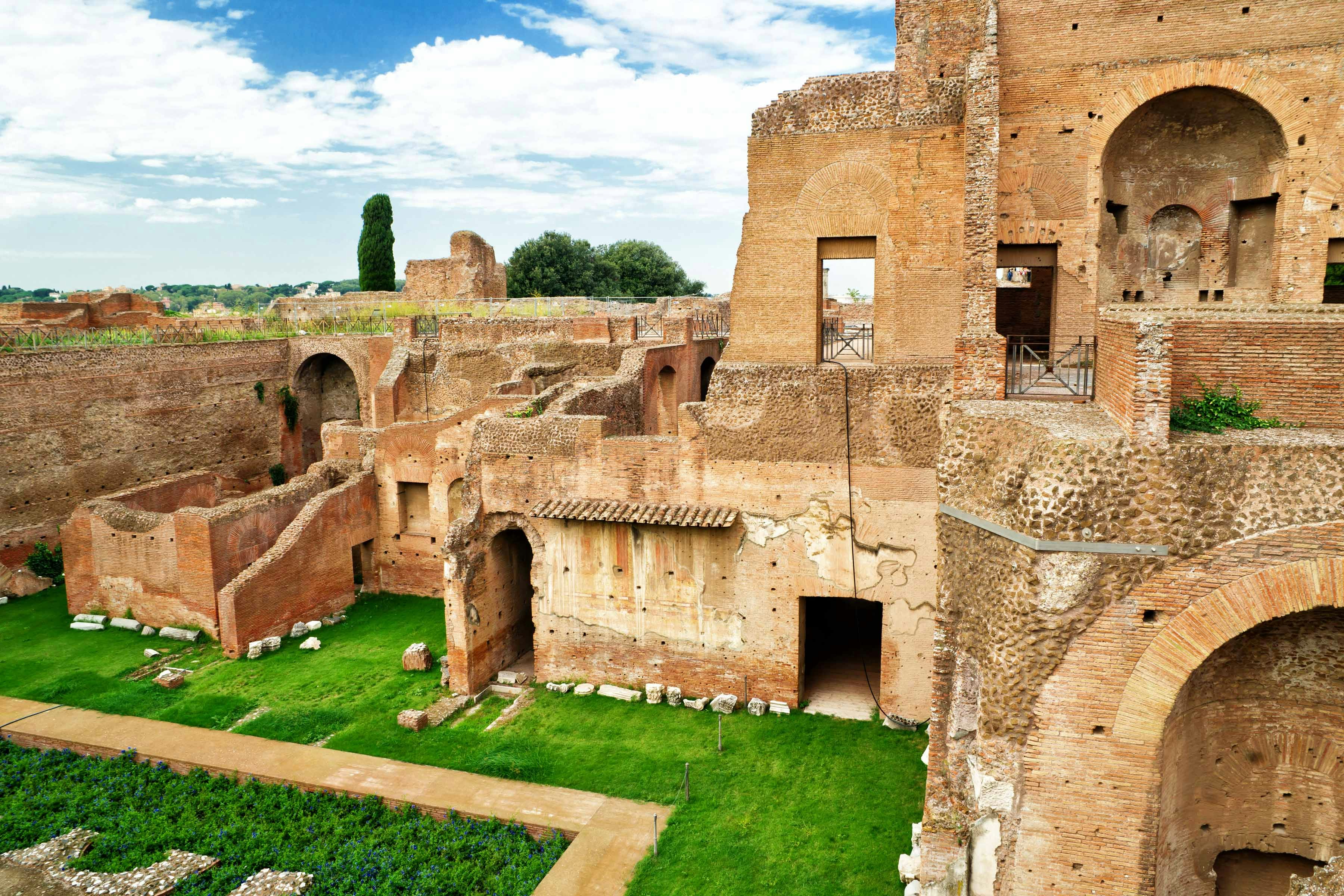 House of Augustus ruins with ancient brick walls and arches in Rome, Italy.