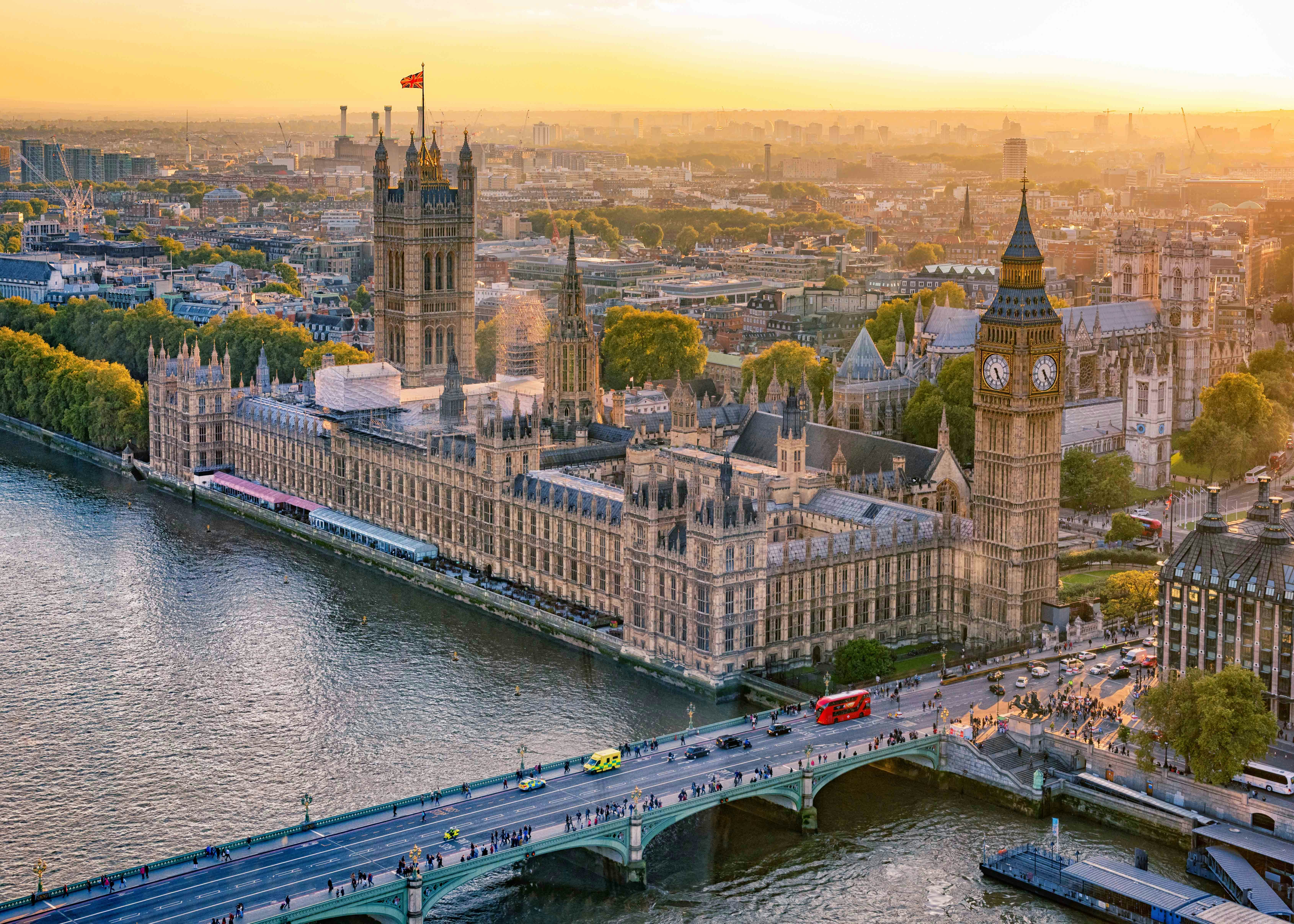 Houses of Parliament view from London Eye, showcasing iconic architecture.
