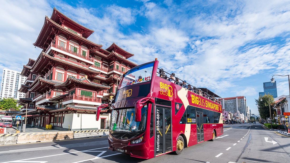 BigBus Singapore tour passing Marina Bay Sands and Gardens by the Bay.