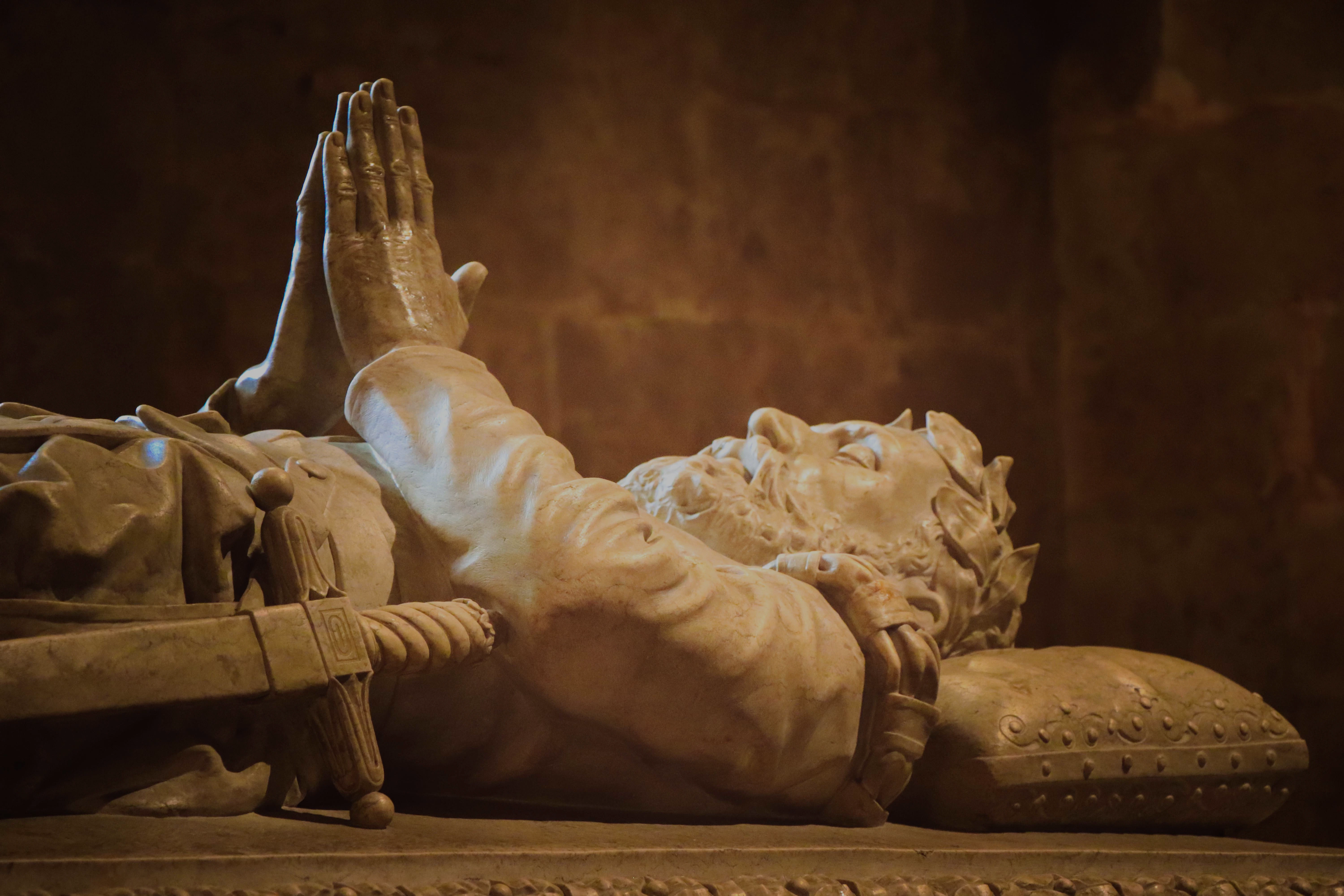 Tomb of Luis de Camoes with detailed stone carving in Lisbon, Portugal.