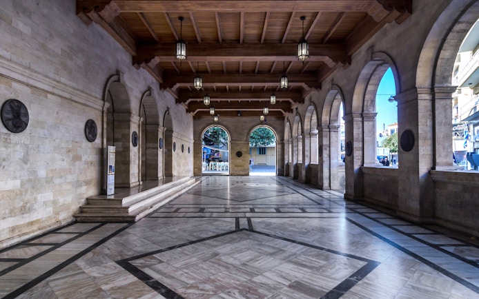 Heraklion Archaeological Museum entrance with ancient artifacts display, Crete, Greece.