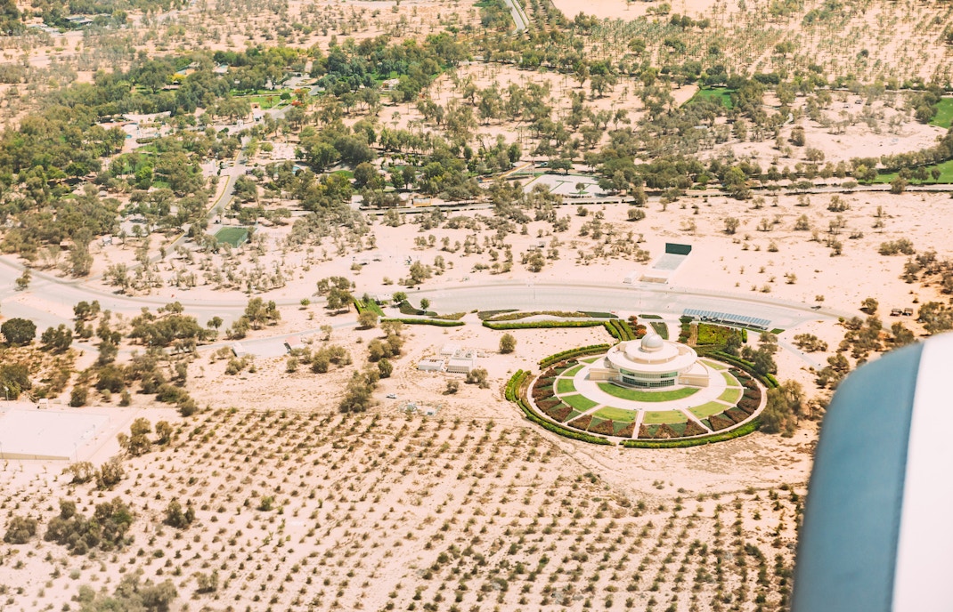 Mushrif National Park Dubai, aerial view of lush greenery and walking paths.