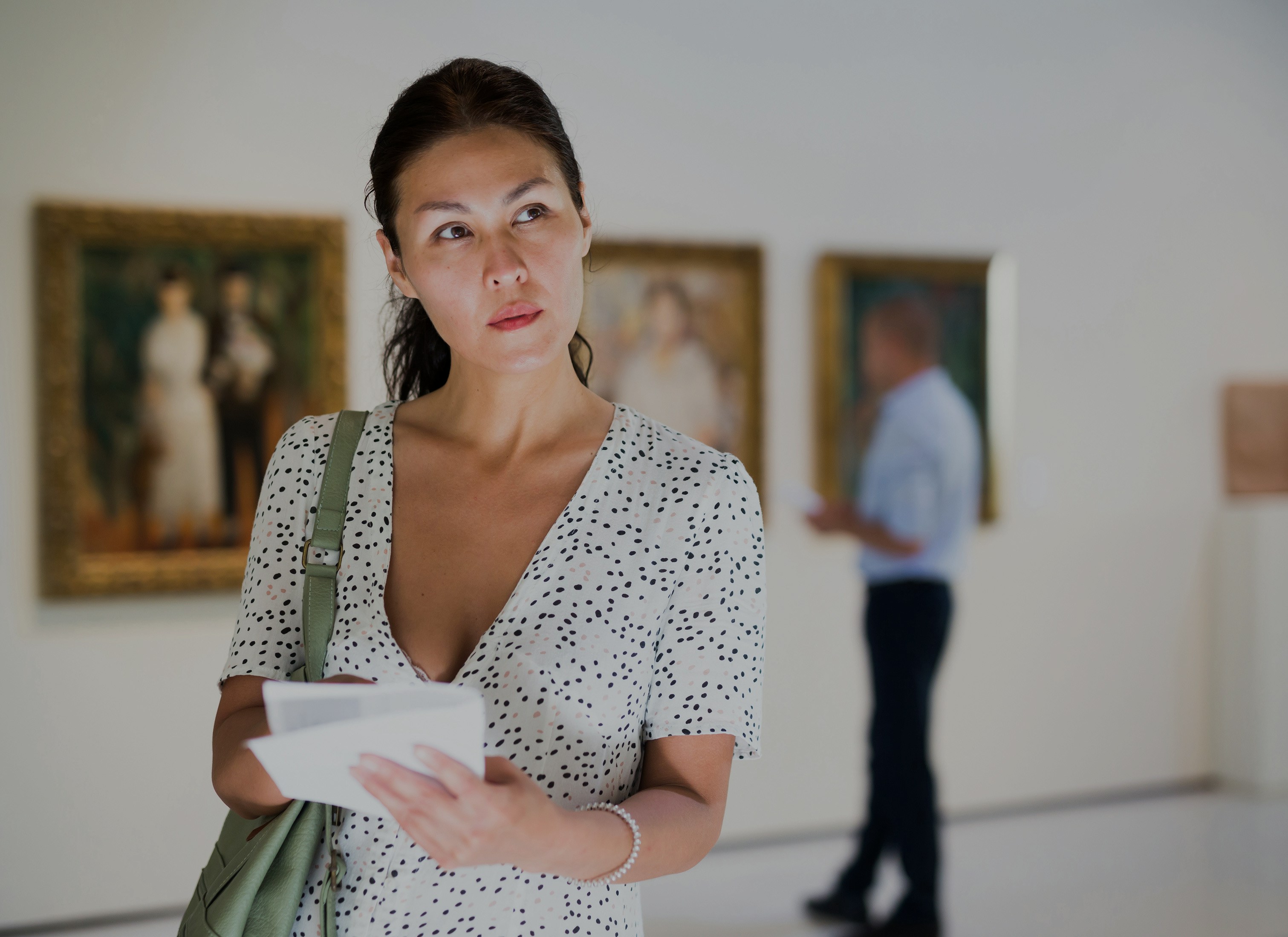 Visitor exploring Picasso Museum exhibition with skip-the-line tickets.