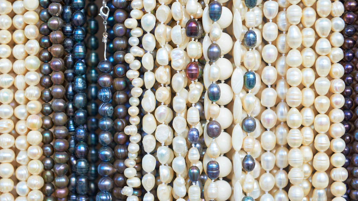 Pearl necklaces displayed as popular souvenirs in Dubai.