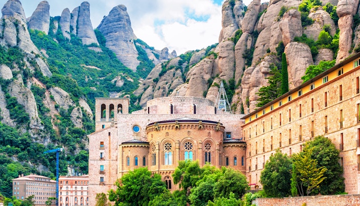 Montserrat mountain range with the Benedictine Abbey of Montserrat in Catalonia, Spain.