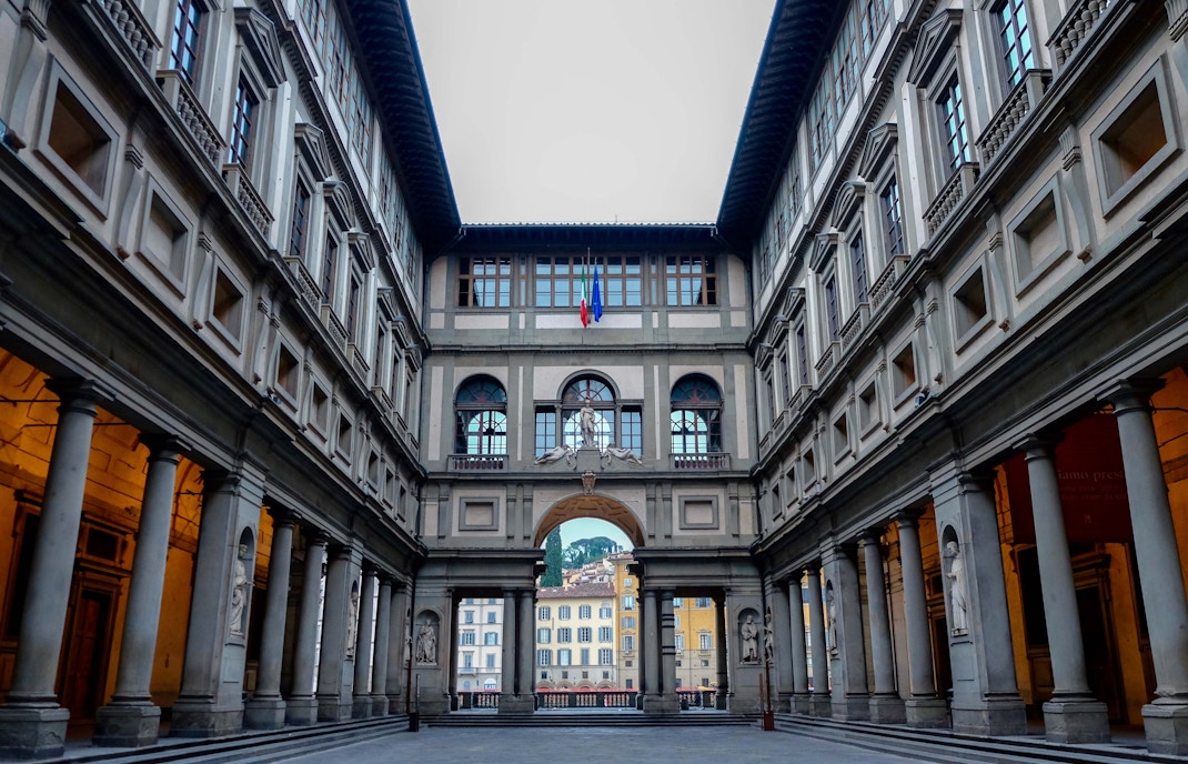 Quiet, off-season ambience at the Uffizi Gallery courtyard, showcasing the symmetrical elegance of Renaissance architecture in Florence