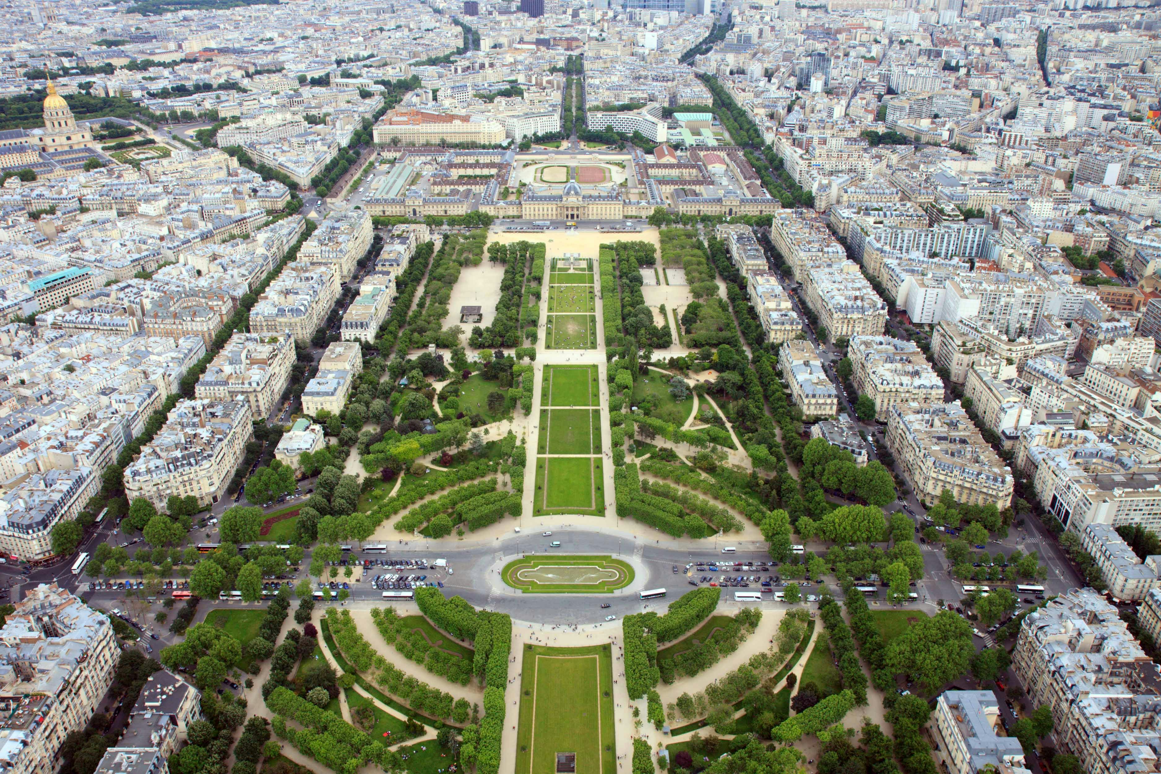 Aerial view of Champ de Mars in Paris, showcasing gardens and surrounding cityscape.