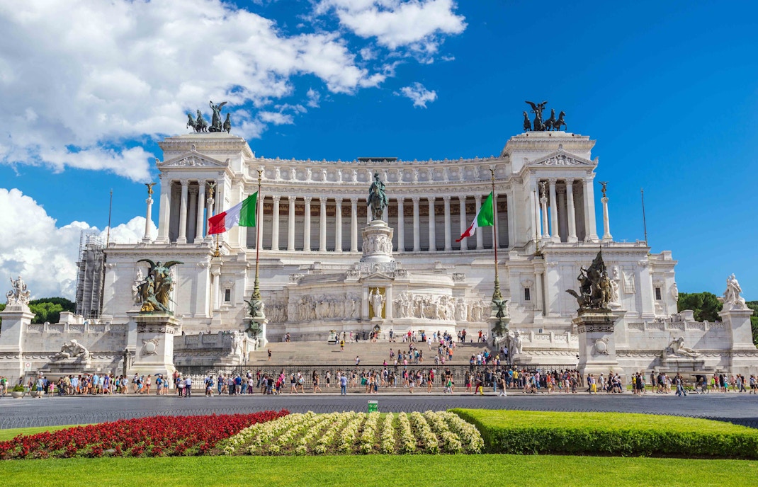 Piazza Venezia in Rome with the iconic Vittoriano monument in the background.