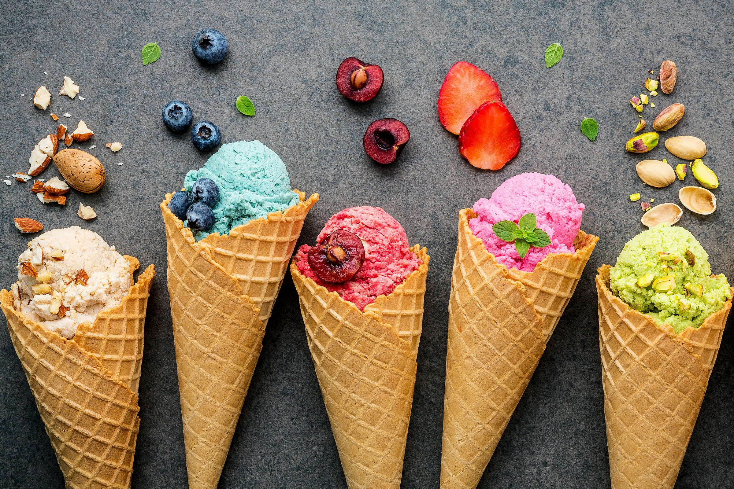 Gelato cones with colorful scoops in Rome, Italy.