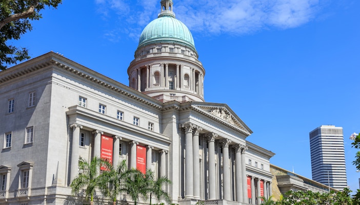 Visitors exploring the National Gallery of Singapore, showcasing a vast collection of modern art in a historic setting
