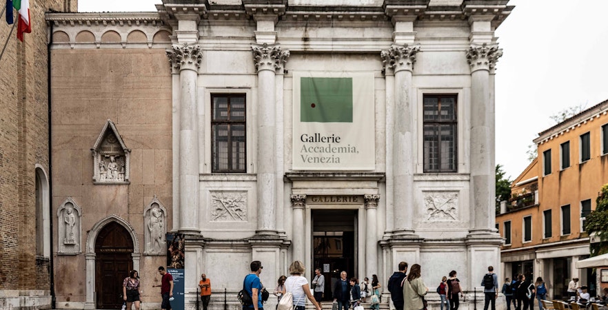 Accademia Gallery entrance in Venice with visitors outside.