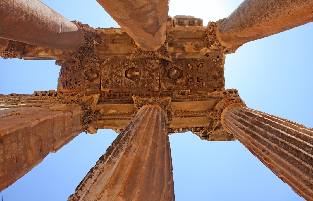 Temple of Poseidon pillars at Cape Sounion, Greece, overlooking the Aegean Sea.