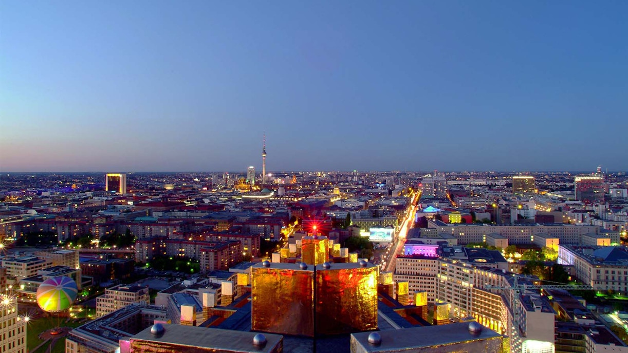 Panoramic view of Berlin cityscape from Panoramapunkt at dusk, featuring the TV Tower.