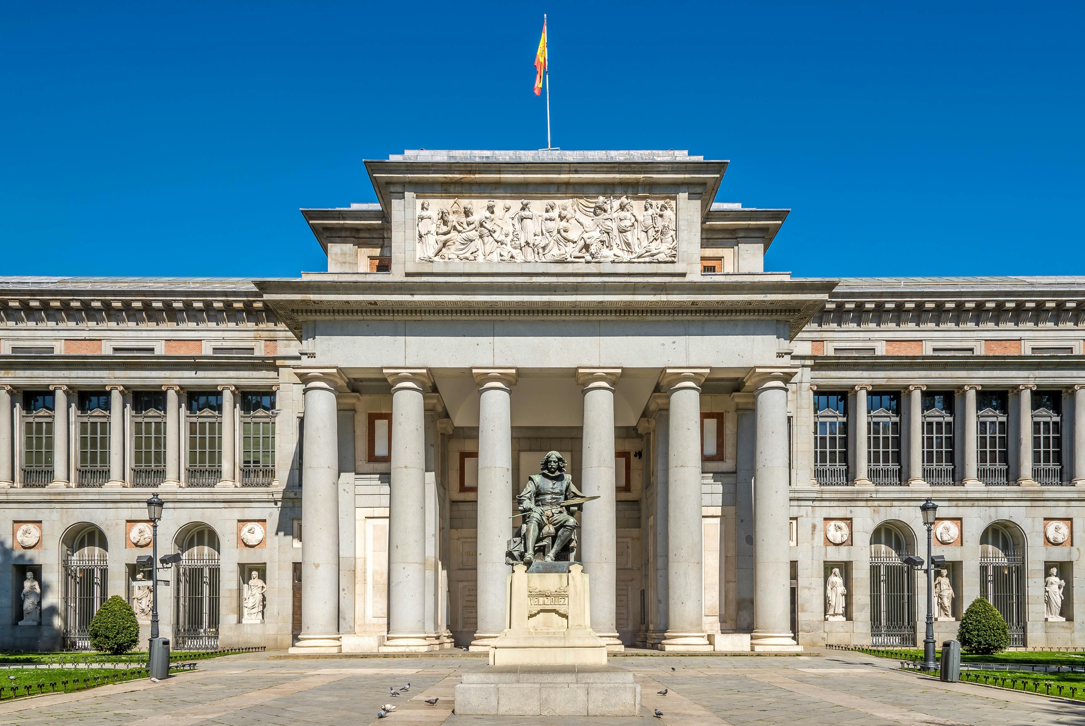 Prado Museum entrance with Velázquez statue, Madrid.