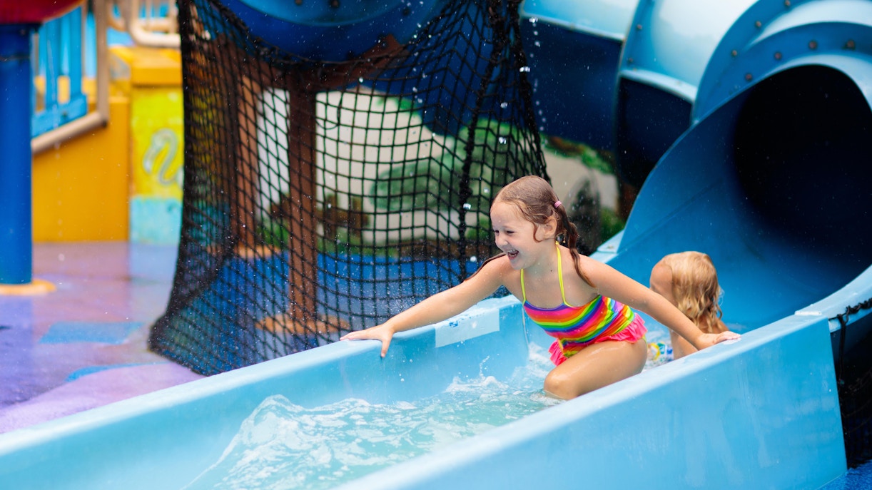 Adventure Cove Waterpark Singapore, featuring water slides and a lazy river.