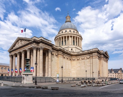 Pantheon in Paris showcasing neoclassical design with columns and dome.