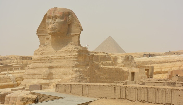 Sphinx of Giza with Pyramid in background, Egypt.