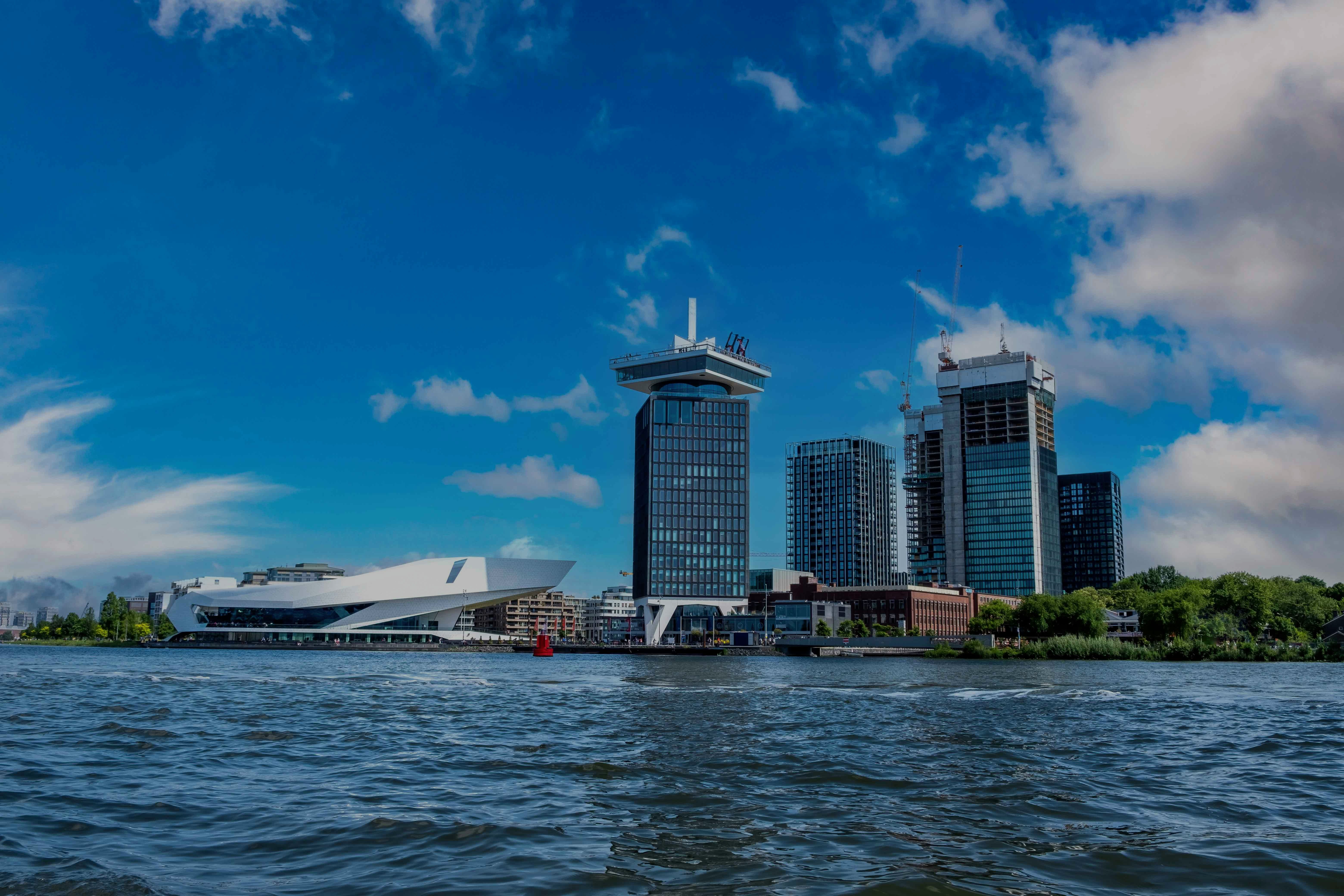 Eye Filmmuseum and A'DAM Tower by the IJ River in Amsterdam.
