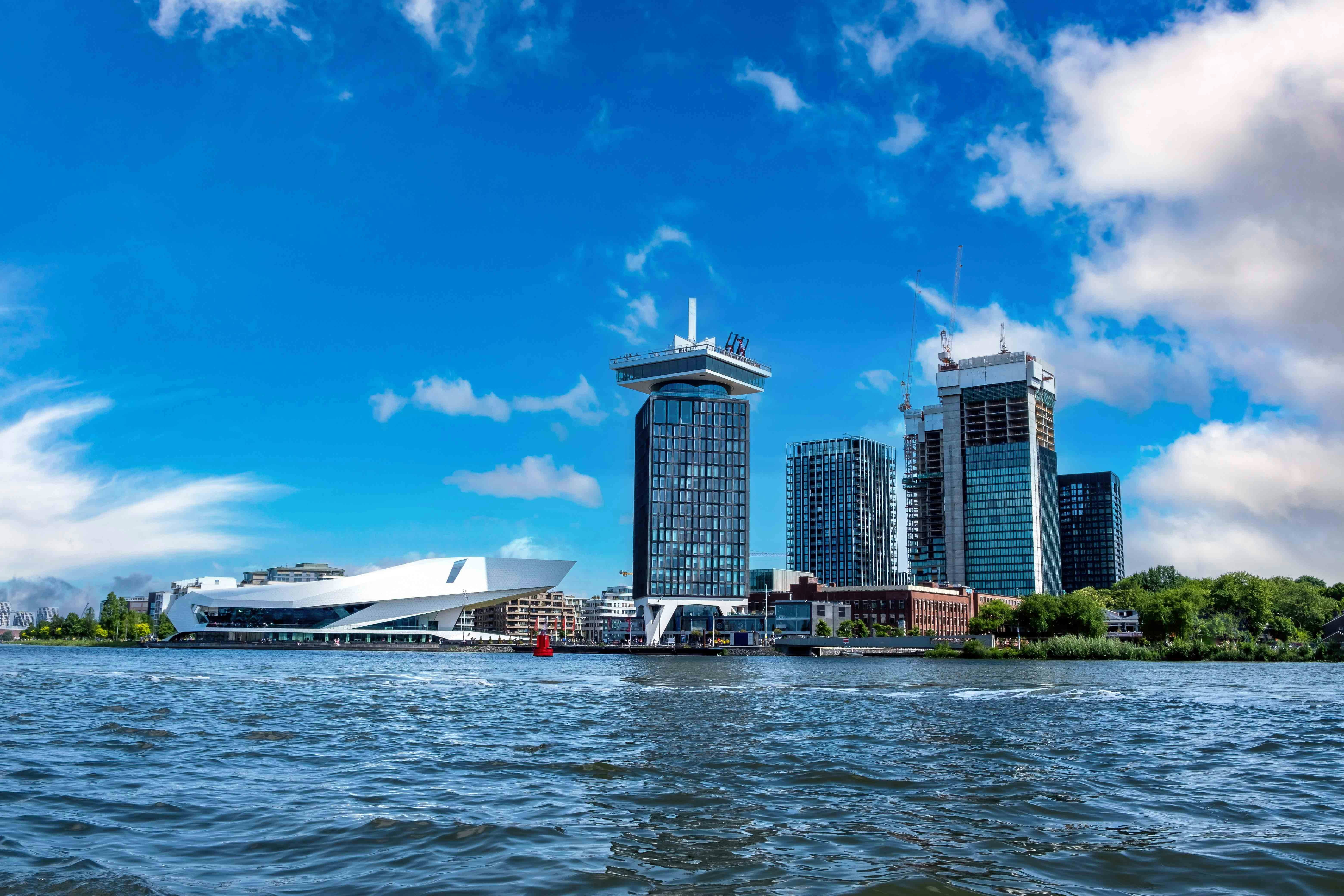 Eye Filmmuseum and A'DAM Tower by the IJ River in Amsterdam.