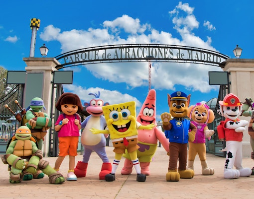 Visitors enjoying rides at Parque de Atracciones in Madrid during March.