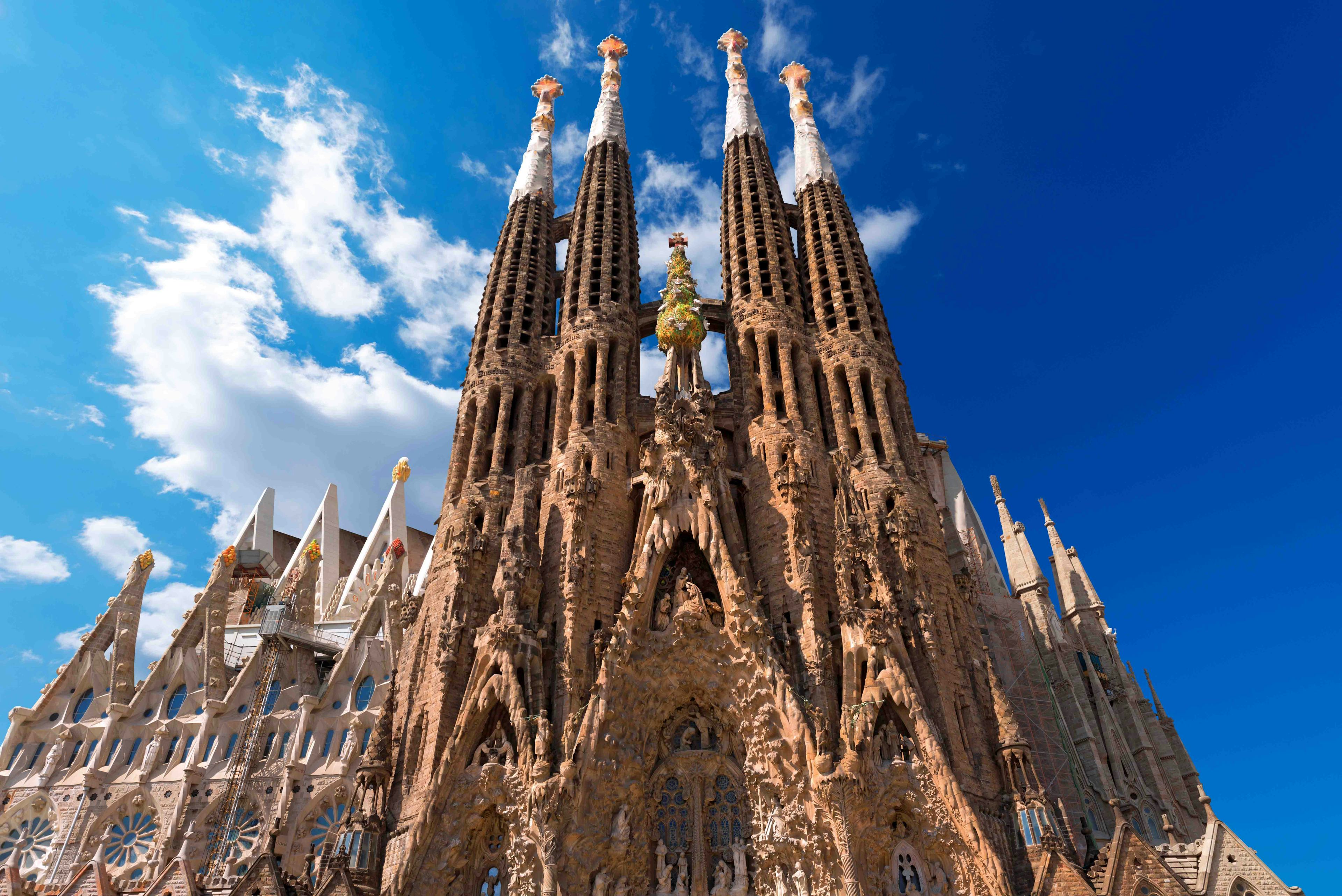 Sagrada Familia Apostle Towers in Barcelona with intricate architectural details.